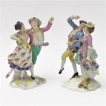 Two similar 19th century hand-decorated German porcelain models of dancers; impressed marks and