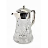 A cut-glass and silver-mounted lemonade jug of conical form: the hinged lid opening to reveal