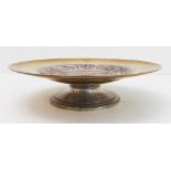 A 19th century French brass and silver-plated copper tazza: central decoration of the head of
