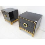 A pair of Craigsville two-drawer, black lacquer and gilded bedside cabinets (50 x 40 x 51 cm)