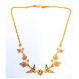 An Edwardian 15-carat yellow gold and seed pearl articulated fringe necklace, the front formed of