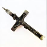 A German silver crucifix with Christ upon an ebony wooden cross, further mounted in silver,