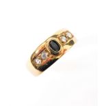 A 9-carat gold ring set with sapphire and brilliant-cut diamonds , ring size O
