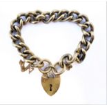 A 9-carat yellow gold curb link bracelet, each link stamped, to the 9-carat yellow gold padlock