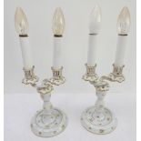 A pair of early 20th century (circa 1915 - 1930) Herend porcelain two-light table candelabra