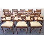 A long set of 13 (12+1) early 19th century Regency period mahogany dining chairs: each chair with