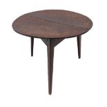 A late 18th century circular-topped oak cricket table of good colour and patination: the two-plank