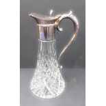 A modern silver-plated mount claret jug in 19th century style and with shaped, lozenge-carved,