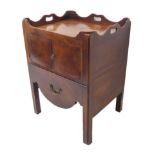 An 18th century mahogany tray top commode of good colour: the back and sides with pierced handles