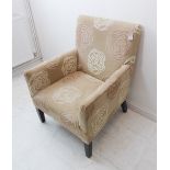 An Edwardian-style (modern) armchair upholstered in William Yeoward fabric, raised on square