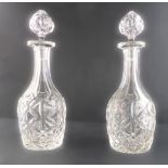 A pair of 19th century heavy cut-glass crystal decanters of mallet form, the tear-drop shaped