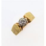 A diamond single stone ring, the brilliant cut diamond coronet set to the tapering bark-textured