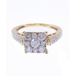 A diamond-set ring , the top and shoulders with 41 diamonds, the shank stamped '14 K', ring size N/