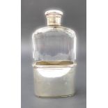 A late 19th century cut-glass spirit flask: hallmarked silver mounted screw-top lid with maker's
