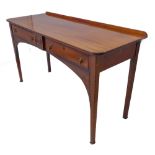 An early 19th century mahogany sideboard: galleried, reeded-edge top above two half-width drawers (