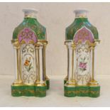 A pair of 19th century Coalport pagoda shaped green enamel and gilt decorated candlesticks. The