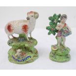 Two early 19th century Walton figures: a ewe and lamb (14 cm high), and a bocage figure of a young