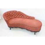 An early 20th century chaise longue: buttonback-upholstered; concave-fronted; kidney-shaped mahogany