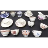 Fourteen mostly early 19th century pieces: 7 tea bowls; 4 cups and saucers; a transfer-decorated