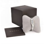 A lady's steel-cased Gucci dress wristwatch of Art Deco inspiration: signed vertical rectangular