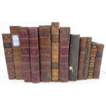 Twelve leather-bound volumes mostly on classical and literary topics and to include: 'The Iliad',