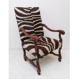 A good and highly unusual pair of late 17th century style zebra skin upholstered and carved walnut