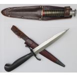 Two commando-style daggers in leather sheaves: 1. Sheffield 14.4 cm blade marked 'R.Kelly & Sons,