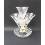 A 20th century lead crystal four-branch epergne. The four hobnail and floral wheel cut glass