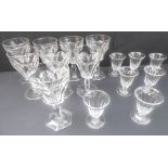 Two sets of late 19th century drinking glasses: eight large, tapering circular faceted bowl