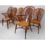 A set of six (4+2) yew wood Windsor chairs in 18th century style and designed and made by Stewart