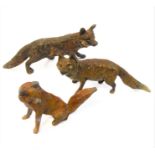 Two early 20th century Austrian cold-painted bronzes modelled as foxes and a spelter fox cub (2.8 cm