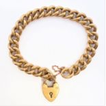 An 18-carat yellow-gold curb link bracelet to18-carat yellow-gold padlock clasp, safety chain (19.