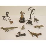 Eleven miniature metal animal figures to include cat, peacock, woodpecker, Dachshund, rooster,