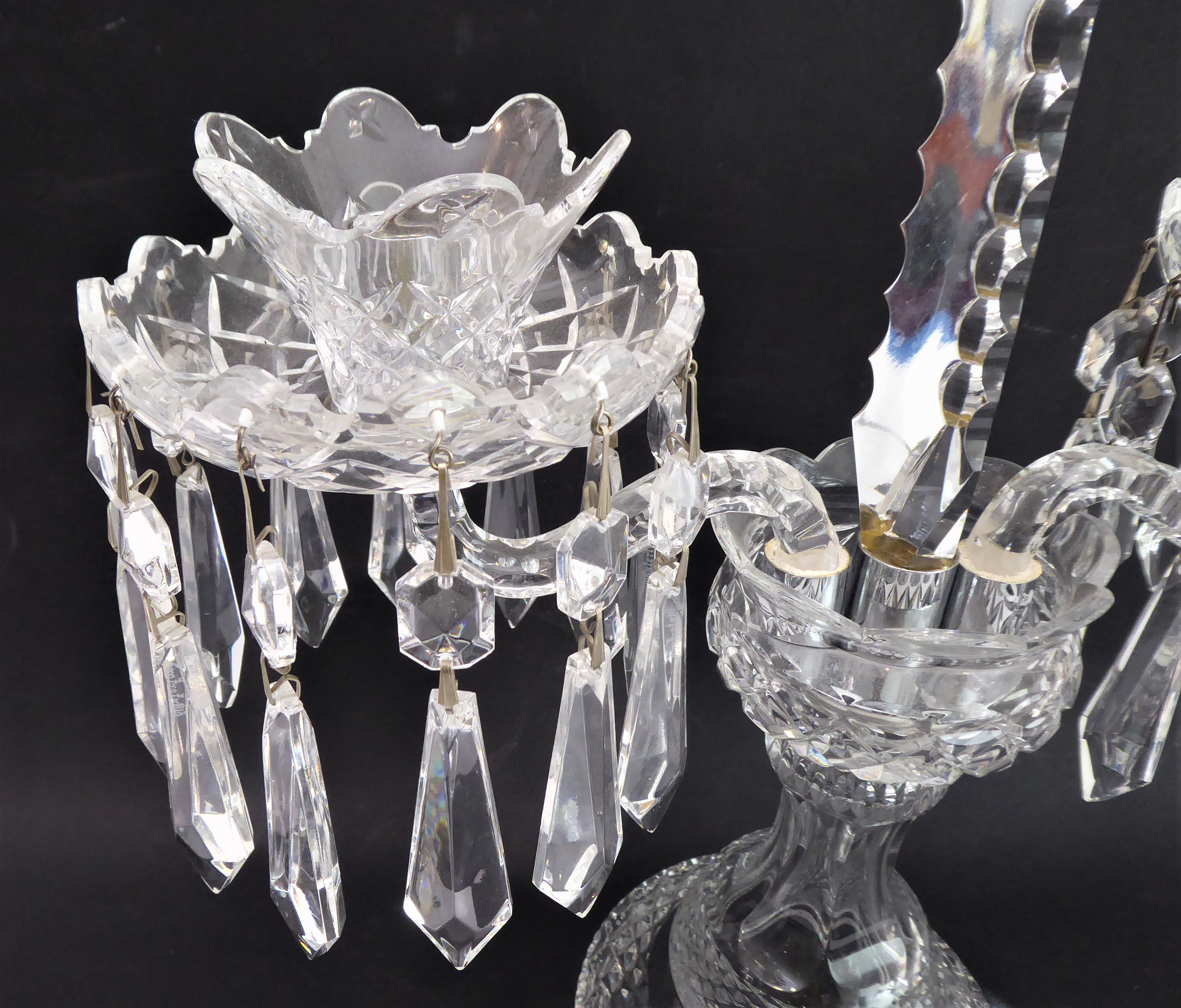 A fine quality cut-glass two-light candelabra table lustre: hand-cut faceted droplets (marked - Image 2 of 2