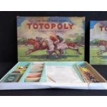 A vintage Waddingtons 'Totopoly- The Great Race Game' complete with all accessories including 12