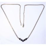 A 9-carat gold, sapphire and diamond necklace with chain extender