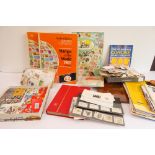 A large collection of world stamps, loose and in albums, and to include: The Globe Master Album