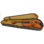 An early 20th century three-quarter-length violin and two bows within an earlier black-painted