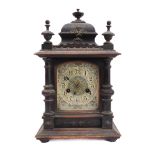 A late 19th century German (H.A.C.) wooden-cased eight-day German chapel-style clock; the domed