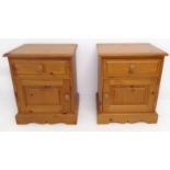 A pair of modern opposing bedside-style pine cupboards: each with a single full-width drawer above a