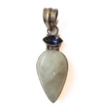 A silver pendant mounted with an opal style inverted pear-shaped polished stone above an