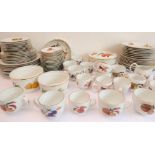 A quantity of Royal Worcester Evesham tableware to include: dinner and side plates, flan dish,