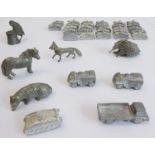 Five miniature cast animals, 28 cast miniature WWII tanks and three other similar vehicles.