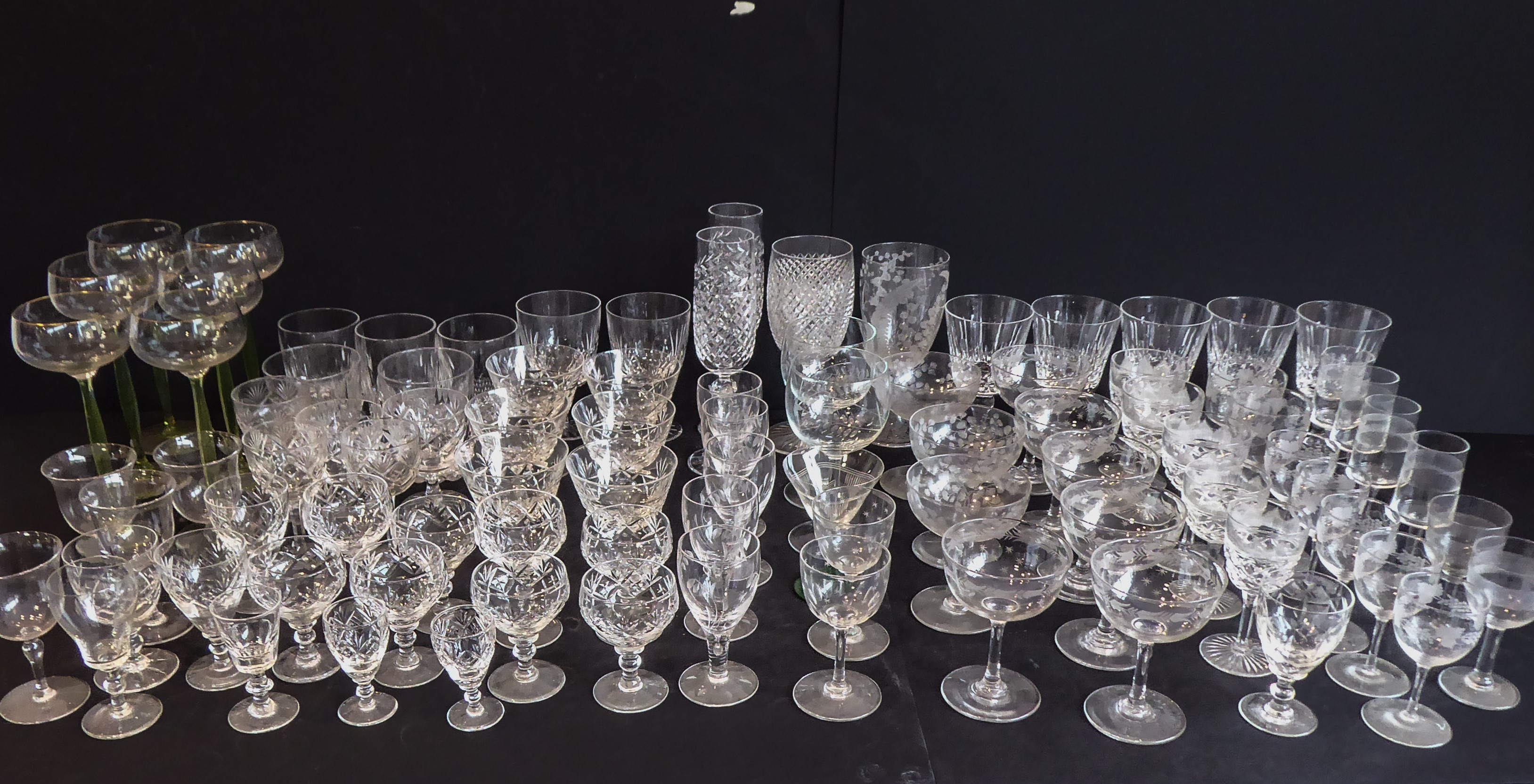 Five trays of various fine quality drinking glasses to include: hocks, hobnail-cut flutes, wines,