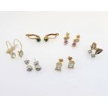 Six pairs of 9-carat gold earrings