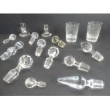 A varied selection of 19th/early 20th century mostly hand-cut decanter stoppers, together with a