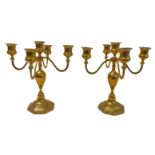 A modern pair of five-light brass candelabra: baluster-shaped stem and on slightly spreading