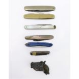 Seven penknives and fruit knives to include a novelty example modelled as a small double-barrel