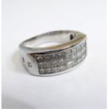 An 18-carat white gold ring set with 27 princess-cut white diamonds, size O/P