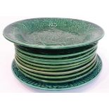 Nine 19th century green vine leaf majolica plates (19 cm) and a Wedgwood green vine leaf bowl with